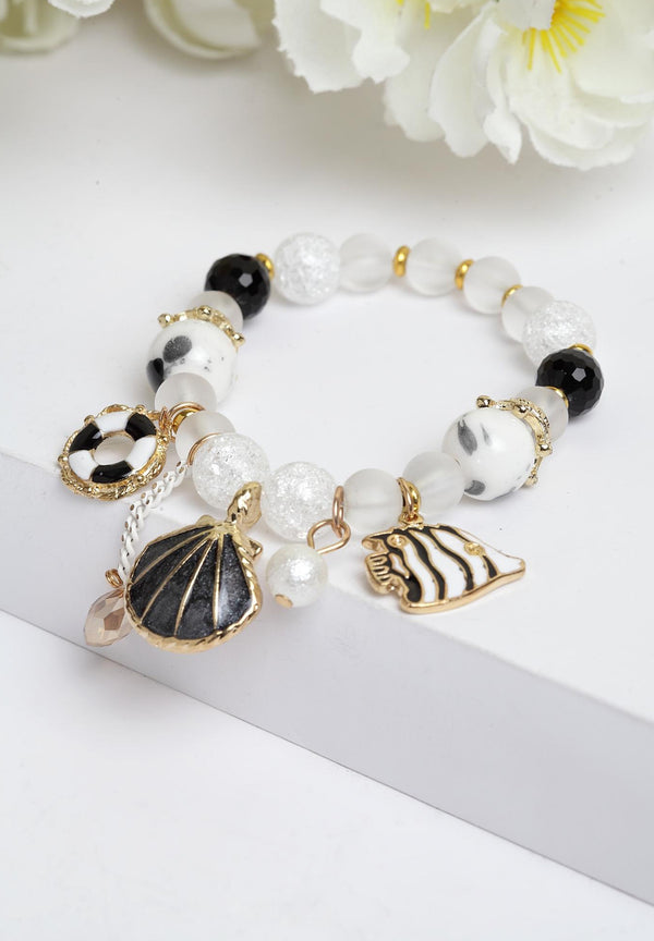 Bracciale con perline di semi di conchiglia Boho